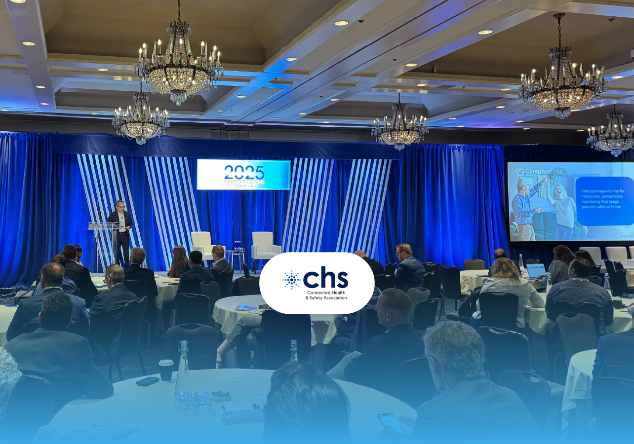 Image of Cognitive's CEO, Dr. Taj Manku, presenting at the 2025 MAMA conference with the logo of the CHS